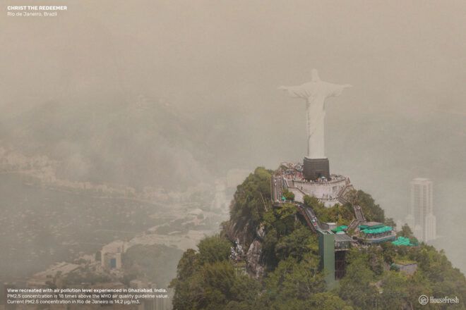 The famous Rio sculpture on a cliff overlooking the city covered in smog