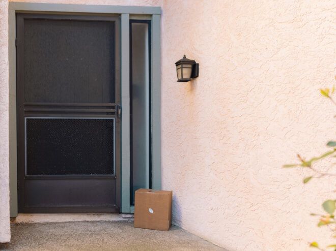 A box placed outside a doorway