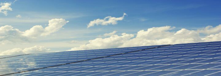 solar panels against a blue sky