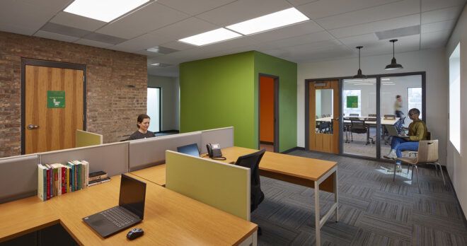 An office area with desks and sectioned areas