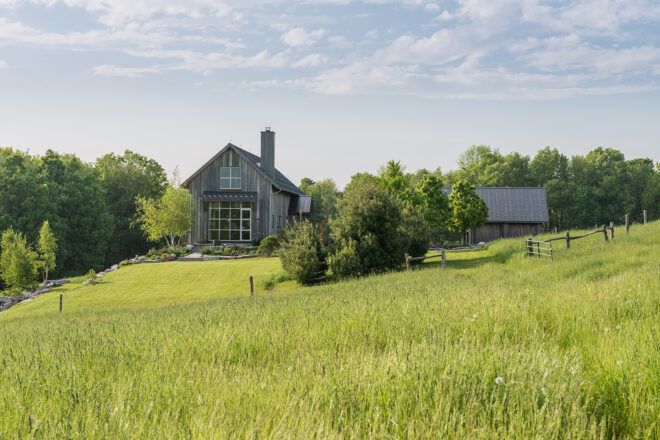Two farmhouses within a praier landscape