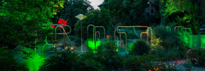 Evening time an overview of a garden populated with copper piping
