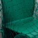 An up-close photo of green net tossed over a green chair