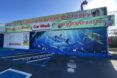 The outside of a carwash and a parking lot