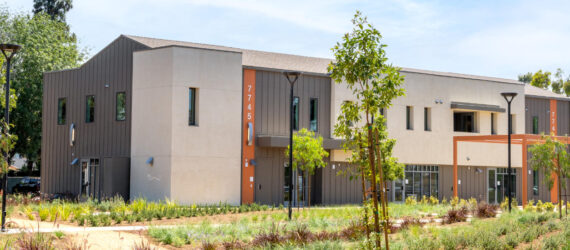 One of the campus buildings with neat landscaping in the foreground