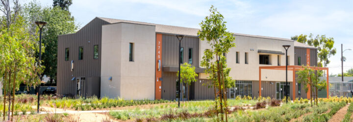 One of the campus buildings with neat landscaping in the foreground