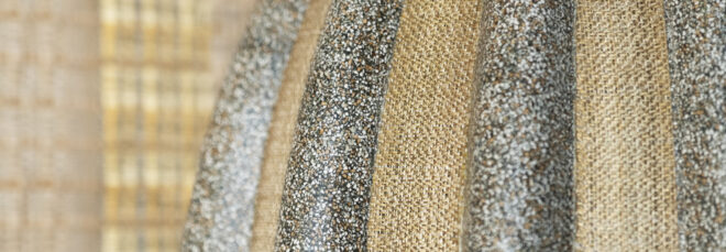 An up-close image of fabric that is silver and gold