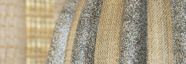 An up-close image of fabric that is silver and gold