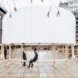 A white inflatable sits on top of a wooden structure