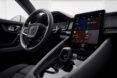 The interior black steering wheel and navigation screen