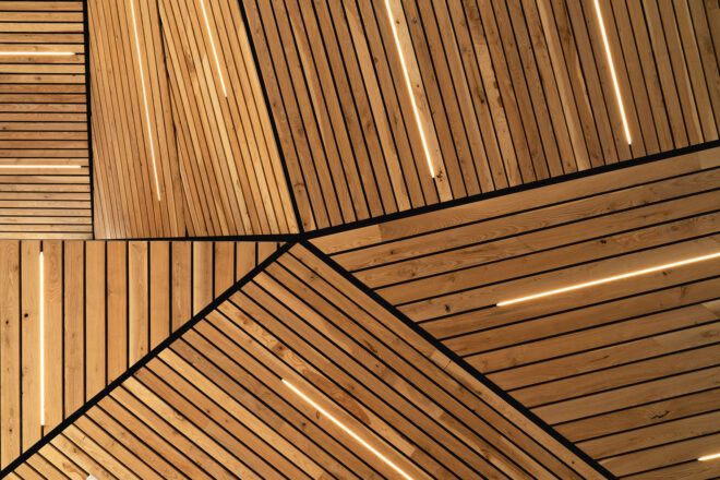 A close view of the ash wood used throughout the public space.