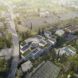 Aerial rendering of the museum, showing its green roofs, spiral ramp, tangerine trees and surrounding context