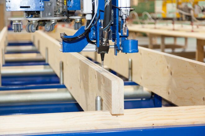Wooden planks assembled with a machinery