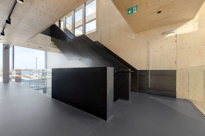 An interior wood of the building with steps leading upwards