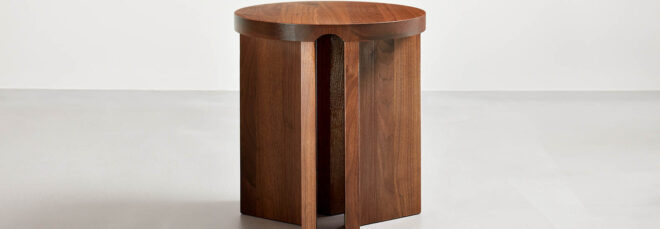 Walnut Umo accent table with a simple background