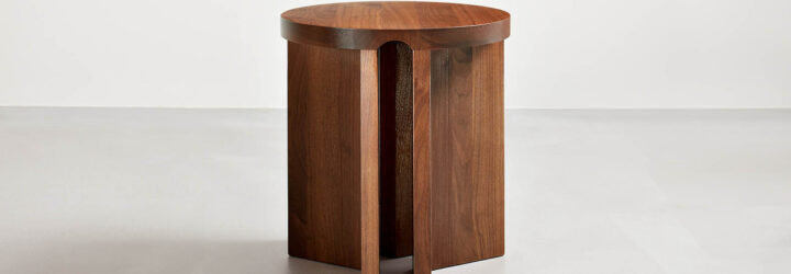 Walnut Umo accent table with a simple background
