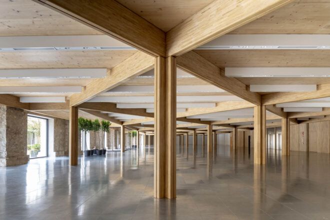 Wooden pillars support the office