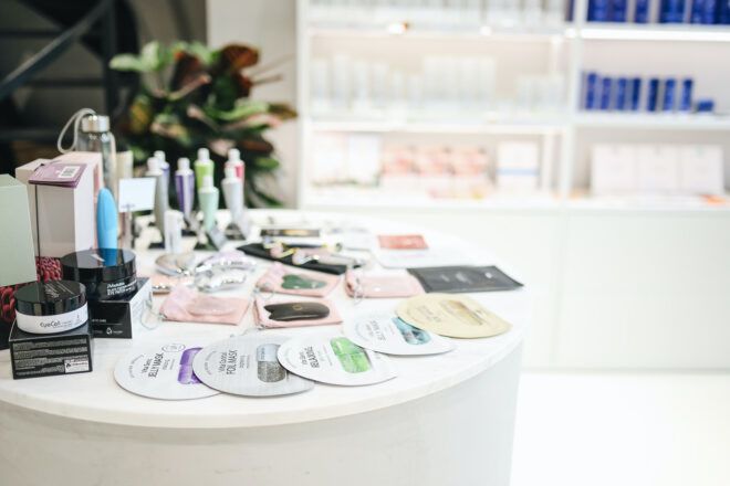 A round table filled with beauty products and masks