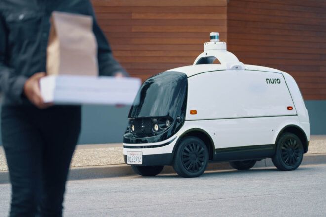 The little EV parked at a curb