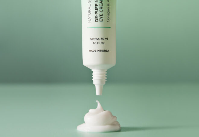 A white tube hovering over a white dollop