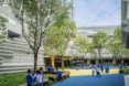 An outdoor pavilion area where students are walking about