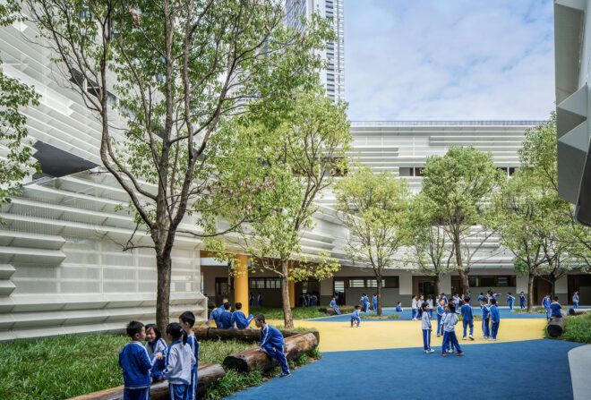 An outdoor pavilion area where students are walking about
