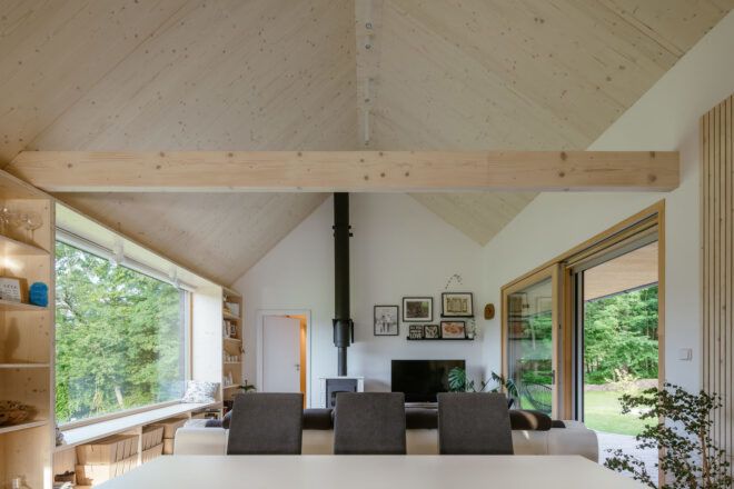 Open concept dining room and living room with wood frames