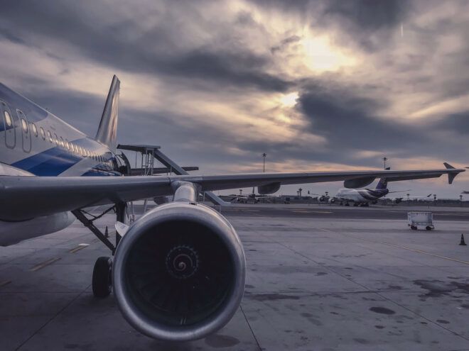 A plane engine on a cloudy day