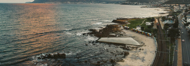 A shoreline near a town