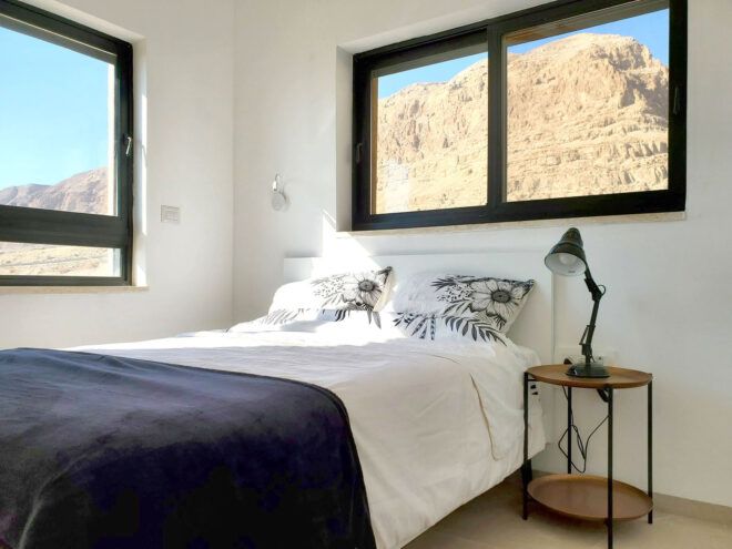 Bedroom with a desert mountain view