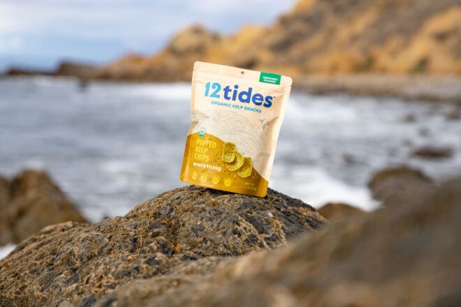Yellow chip bag on the beach