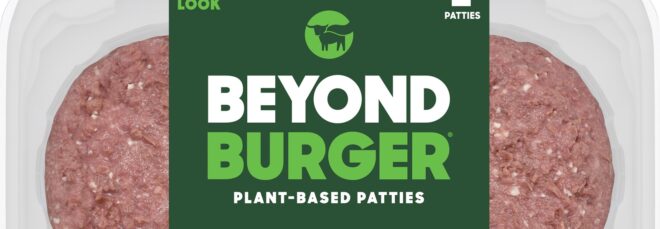Raw burger patties in a clear packaging that read Beyond Burger