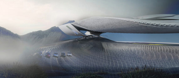 A long structure set in a sandy landscape