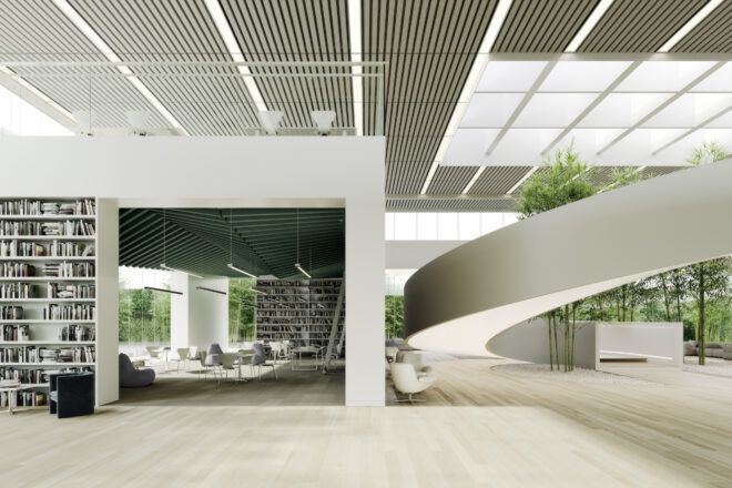 Work space surrounded by bookshelves. Ceiling features Hues Topo Green ceiling baffles