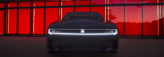 The EV concept illuminated by red lights where the front of the car lights up