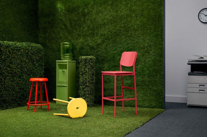 High red chair with greenery around