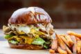 Jalapeno popper burger on a wheat bun