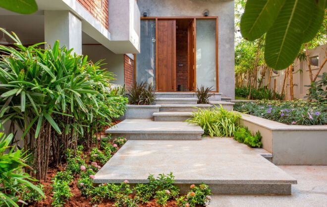 Concrete steps leading to the front door of a home