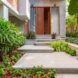 Concrete steps leading to the front door of a home
