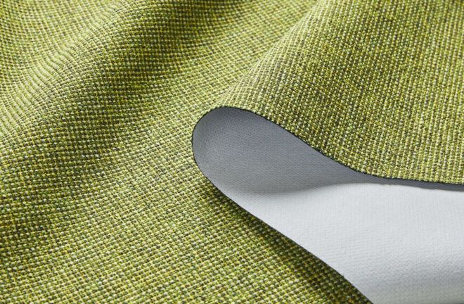 A light green fabric with a gritty texture