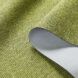 A light green fabric with a gritty texture