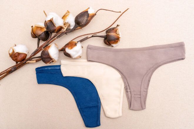 Three pairs of thongs in gray, white and blue