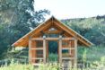 A timber structure with a pitched roof