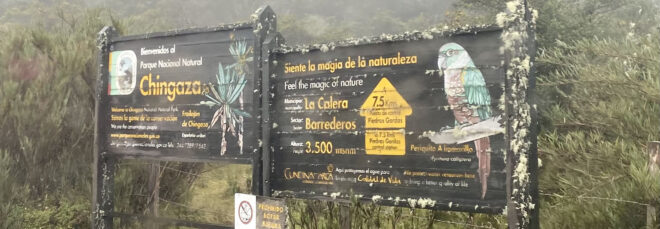 Park signs on wood and featuring native birds