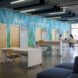 Student study area with blue and green wallpaper