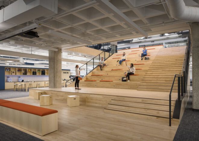 Wooden bleachers within the library for speakers or students to study