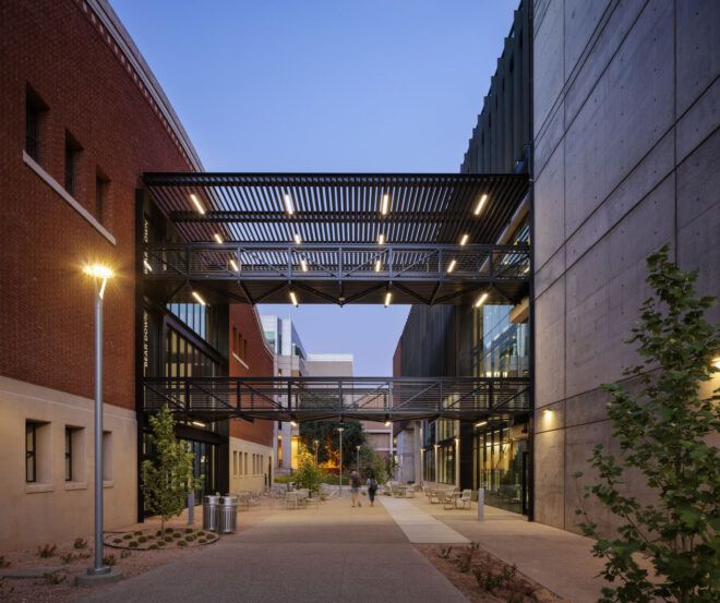 An open bridge connecting two buildings on the campus