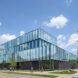 Corner view of the building and glass facade