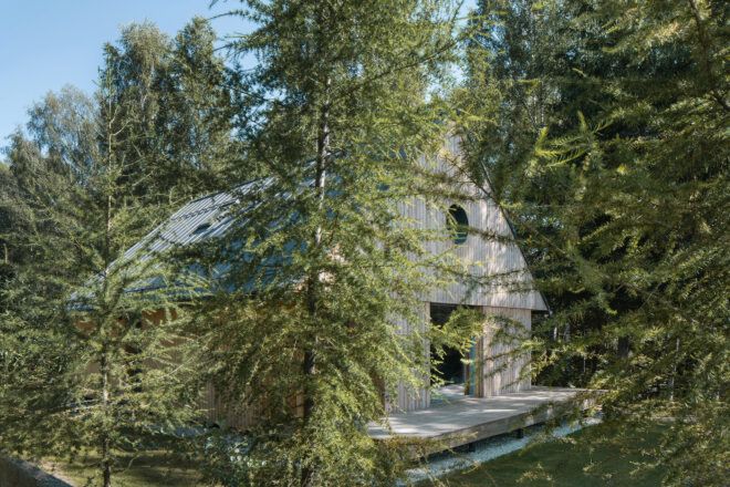 A wooden cabin hidden in the woods
