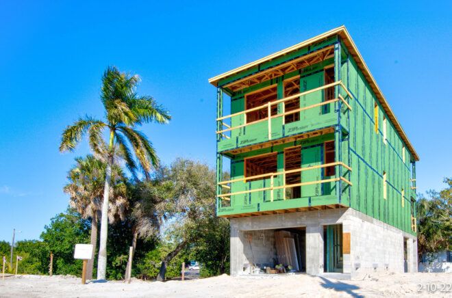 A condo under construction by the beach